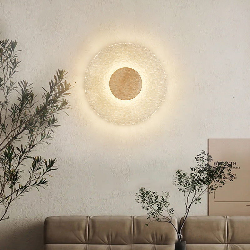 exklusiv vägglampa i modern cirkulär design med akryl och sten för lyxig inredning