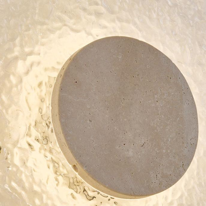 exklusiv vägglampa i modern cirkulär design med akryl och sten för lyxig inredning